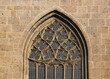 Gothic window tracery detail at the medieval church facade of St Georg in the old town of Nördlingen, Bavaria in Germany