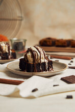 Closeup Of A Freshly Baked Delicious Pumpkin Chocolate Brownie With Ice Cream On A Plate