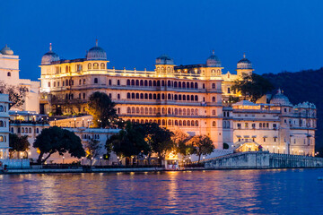 Wall Mural - Night view of  City palace in Udaipur, India