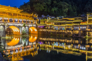 Wall Mural - Evening view of Hong bridge in Fenghuang Ancient Town, Hunan province, China