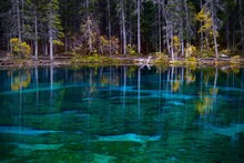 Colorful Lake With Autumn Forest And Reflectionas In Canadian Rockies. Grassi Lakes Near Canmore In  Rocky Mountains. Alberta. Canada