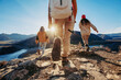 © cppzone - Three tourists hikers walks in sunset mountains