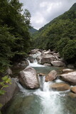 Fototapeta Desenie - View of creek and waterfall at Dazhang mountain, Crouching Dragon valley, (Chinese: Dazhangshan, Wolonggu), Wuyuan county, Jiangxi Province, China