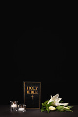 Sticker - lily, candles and holy bible on black , funeral concept