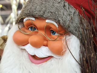 Friendly Face of Santa claus with blue eyes and a white beard