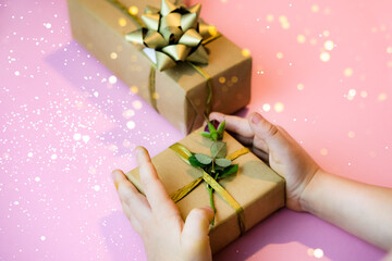 Child's Hands holding craft gift box