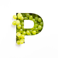 Letter P of English alphabet of green grape and cut paper isolated on white. Typeface made of fresh berries