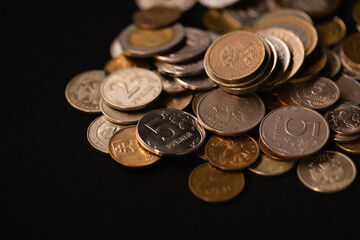 Wall Mural - coins on black background, funeral concept, stock image