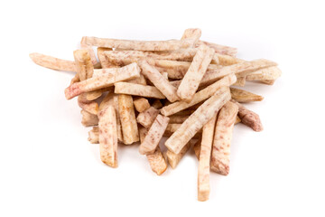 Pile of dehydrated taro snack sticks isolated over white