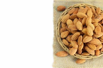 Wall Mural - closeup almond nut isolated in white background with copy space