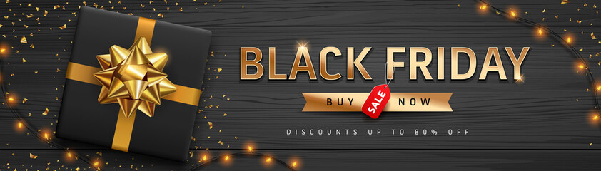 Wall Mural - Black Friday Sale gold message. black gift box and gold ribbons, banners design on black wood background. Eps 10 vector illustration