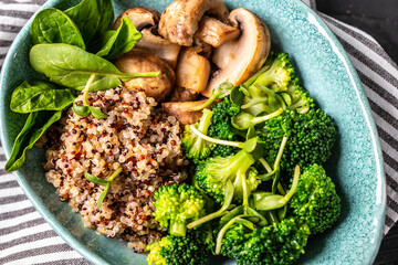 Canvas Print - Buddha bowl. Raw vegetables with mushrooms and broccoli and quinoa. superfood concept. Clean healthy detox eating. Vegan vegetarian food. Top view