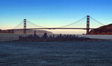 Fototapeta Londyn - Golden Gate Bridge superimposed over San Francisco