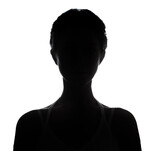 Fototapeta Zachód słońca - Female person silhouette in the shadow, back lit light