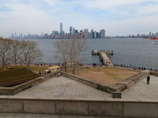 Wall Mural - Lower Manhattan skyscrapers and buildings view from the Statue of Liberty in New York City United States