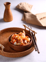 Sticker - korean spicy kimchi in a wooden bowl