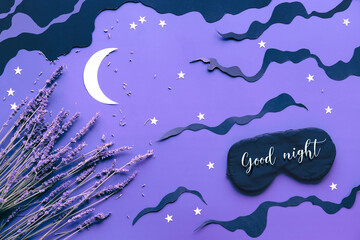 sleep mask with lavender on purple color background with black clouds, moon and stars. text good nig