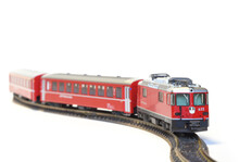 Scale Model Of Red Train Isolated On White