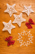 © photosvideos - traditional crochet Christmas tree decorations, wooden background, christmas, flat lay