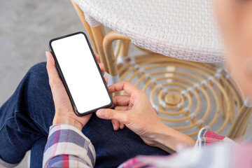 cell phone blank white screen mockup.woman hand holding texting using mobile on desk at office.background empty space for advertise.work people contact marketing business,technology