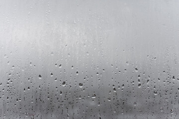 dripping condensation, water drops background rain drop condensation texture. close up for misted gl