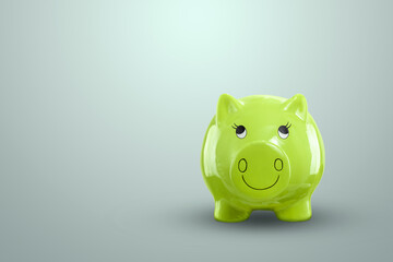 Close-up green pig piggy bank on a light background. Family savings concept, saving funds, bank deposit. Copy space.