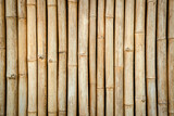 Fototapeta Dziecięca - Bamboo fence texture background. Bamboo wall background. Dry bamboo texture exactly vertically straight wall floor light. Eco natural background concept