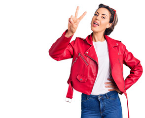 Young beautiful woman wearing red leather jacket showing and pointing up with fingers number two while smiling confident and happy.