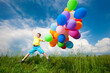 © Eduard Stelmakh - Happy boy jump on meadow with balloons
