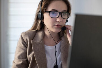 Young woman working in a call center