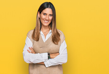 Young woman wearing casual clothes happy face smiling with crossed arms looking at the camera. positive person.