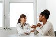© bnenin - Visiting doctor at clinic.