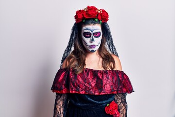 Poster - Young woman wearing day of the dead costume over white skeptic and nervous, frowning upset because of problem. negative person.