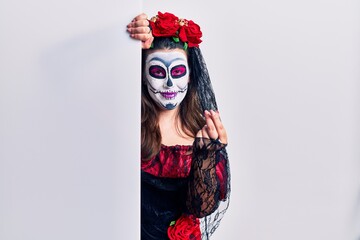 Poster - Young woman wearing day of the dead custome holding blank empty banner doing money gesture with hands, asking for salary payment, millionaire business