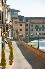 Wall Mural - Florence, Italy - 2020, November 19: Very few people on Lungarno, during Covid-19 pandemic lockdown.
