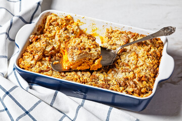 Sticker - Pumpkin dump cake on a white marble background