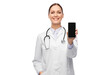 © Syda Productions - medicine, profession and healthcare concept - happy smiling female doctor or nurse with stethoscope showing smartphone over white background