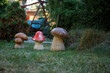 Beautiful landscape design with artificial figurines in the form of mushrooms.