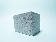 Aerated Concrete Block On Blue Background