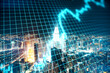 © Who is Danny - Growing stock chart with digital grid on night city background.