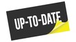 © outchill - UP-TO-DATE text on black yellow sticker stamp.