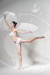 © Artem Popov - graceful ballerina dancing in bubble