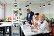 © alfa27 - brainstorming time of people in the light office, team solve problems, discuss projects together
