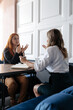 © irissca - Mental health concept. Communication session of woman psychologist and client. Psychotherapy or talk therapy as help people with variety of mental illnesses and emotional difficulties