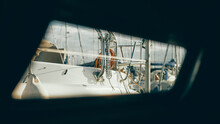 View Through Sailboat's Hatch Of Neighbouring Yacht In Marina