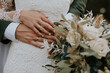 © Alina Schessler - hands of bride and groom on a wedding