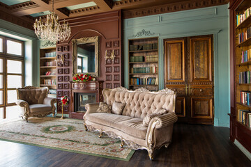 Luxury interior of home library. Sitting room with elegant furniture