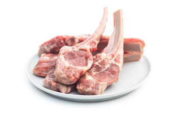 Slices raw lamb chops on plate