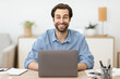 © Prostock-studio - Excited Businessman At Laptop Working Online Posing In Home Office