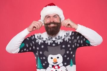 Wall Mural - Christmas mood. new year party fun. celebrate winter holidays. merry christmas. man in funny knitted sweater. xmas shopping time. male winter fashion. happy bearded whiskered man in santa hat